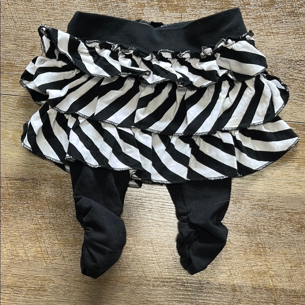 Black and White Striped Ruffle Skirt with Cinched Leggings